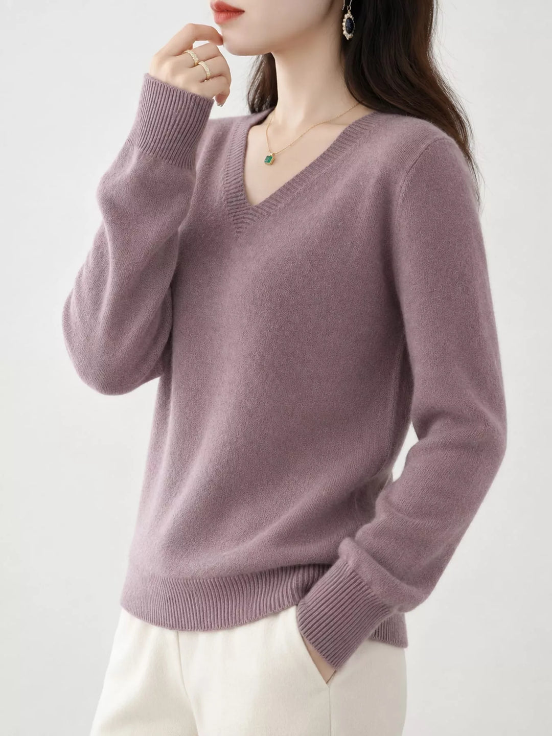 Light Purple V neck sweater worn on-model, side angle with a relaxed fit