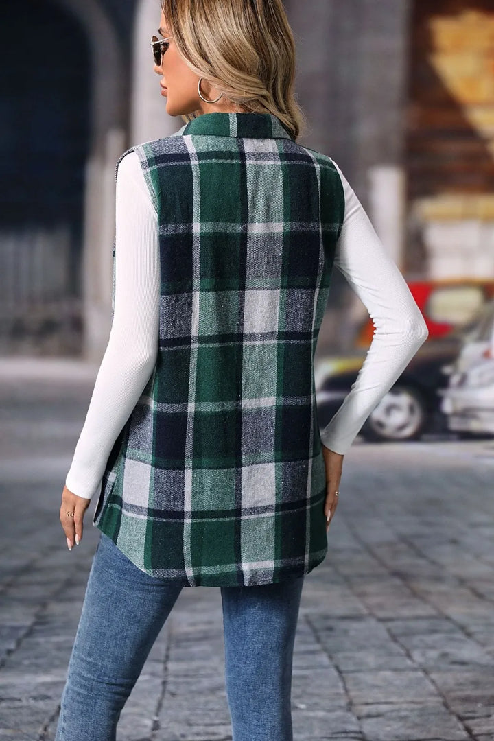 Back view of the dark green plaid longline vest