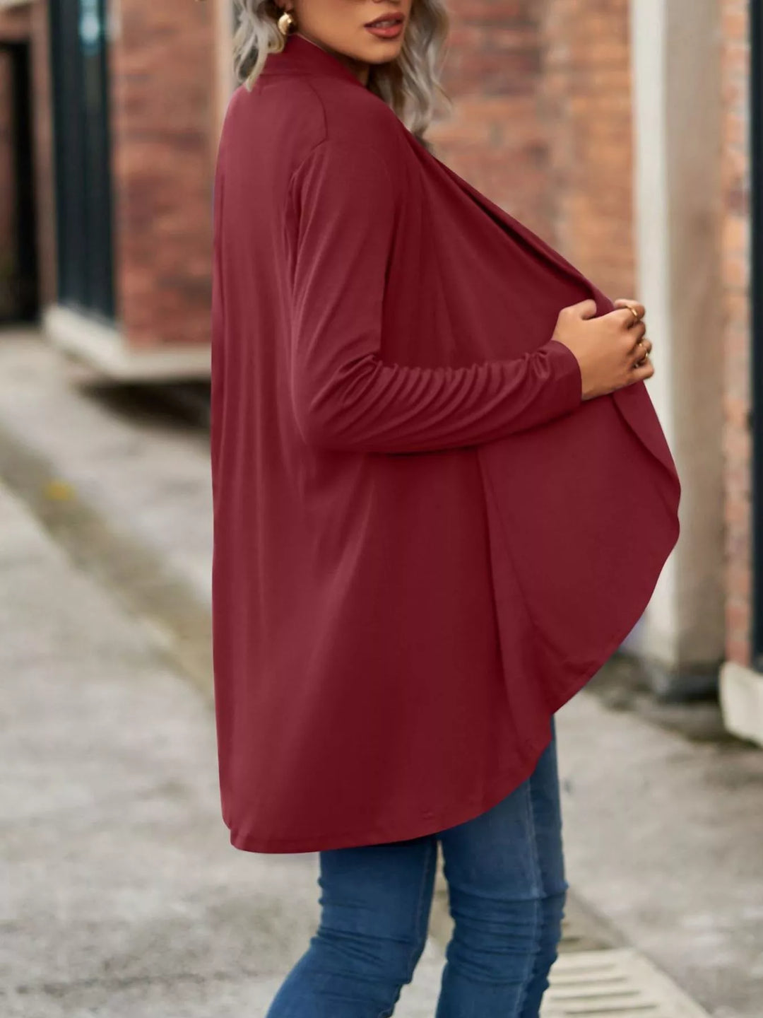 Side view of the burgundy waterfall cardigan with soft drape