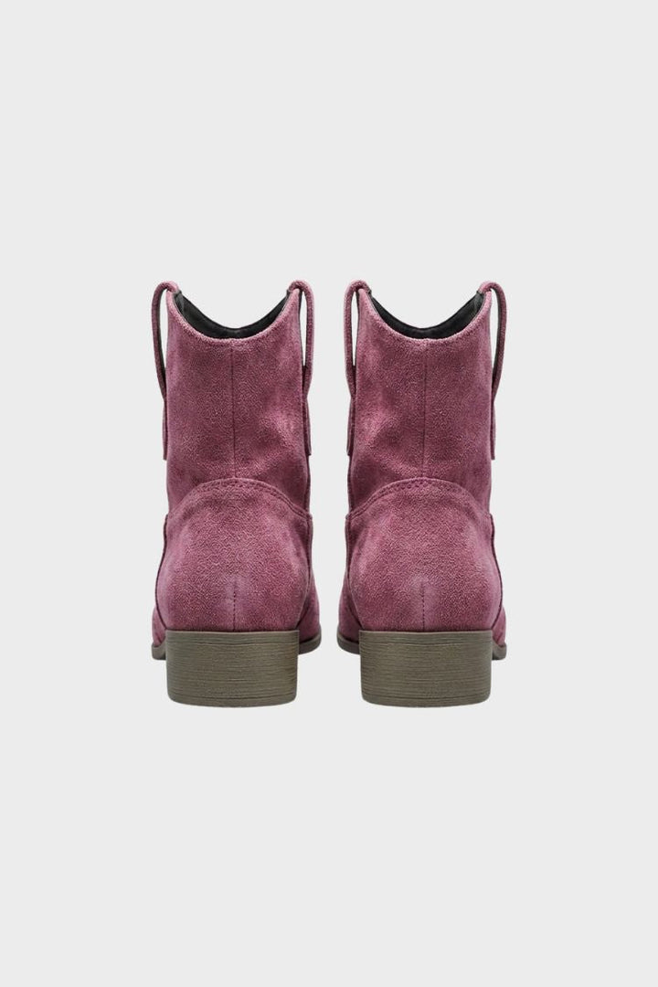 Burgundy western ankle boots seen from the back, block heel