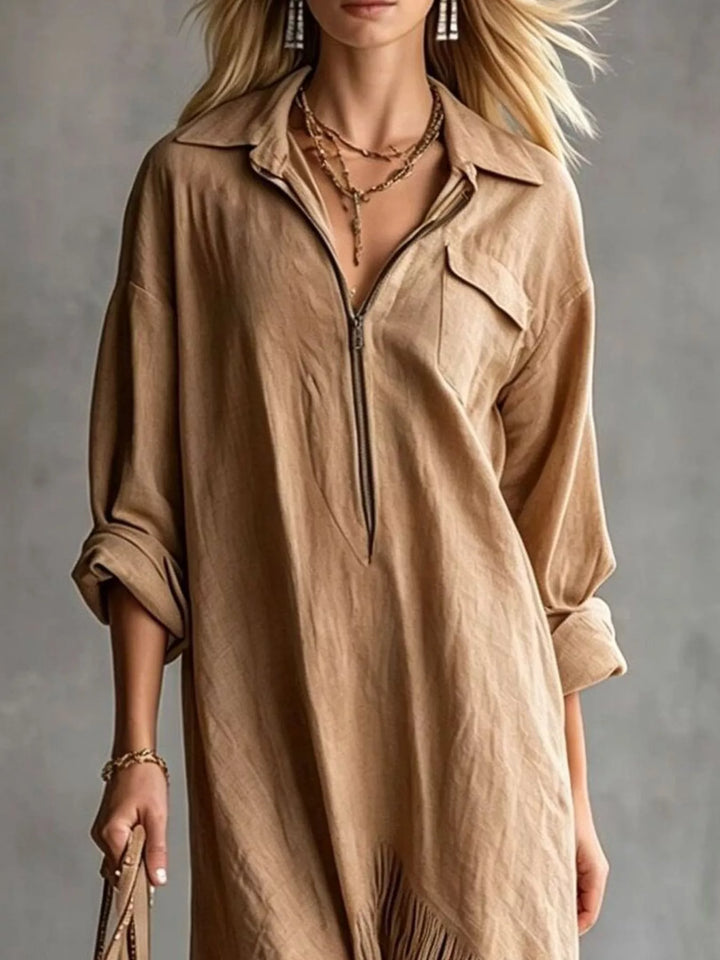 Camel shirt dress worn on a model, showing the pointed collar