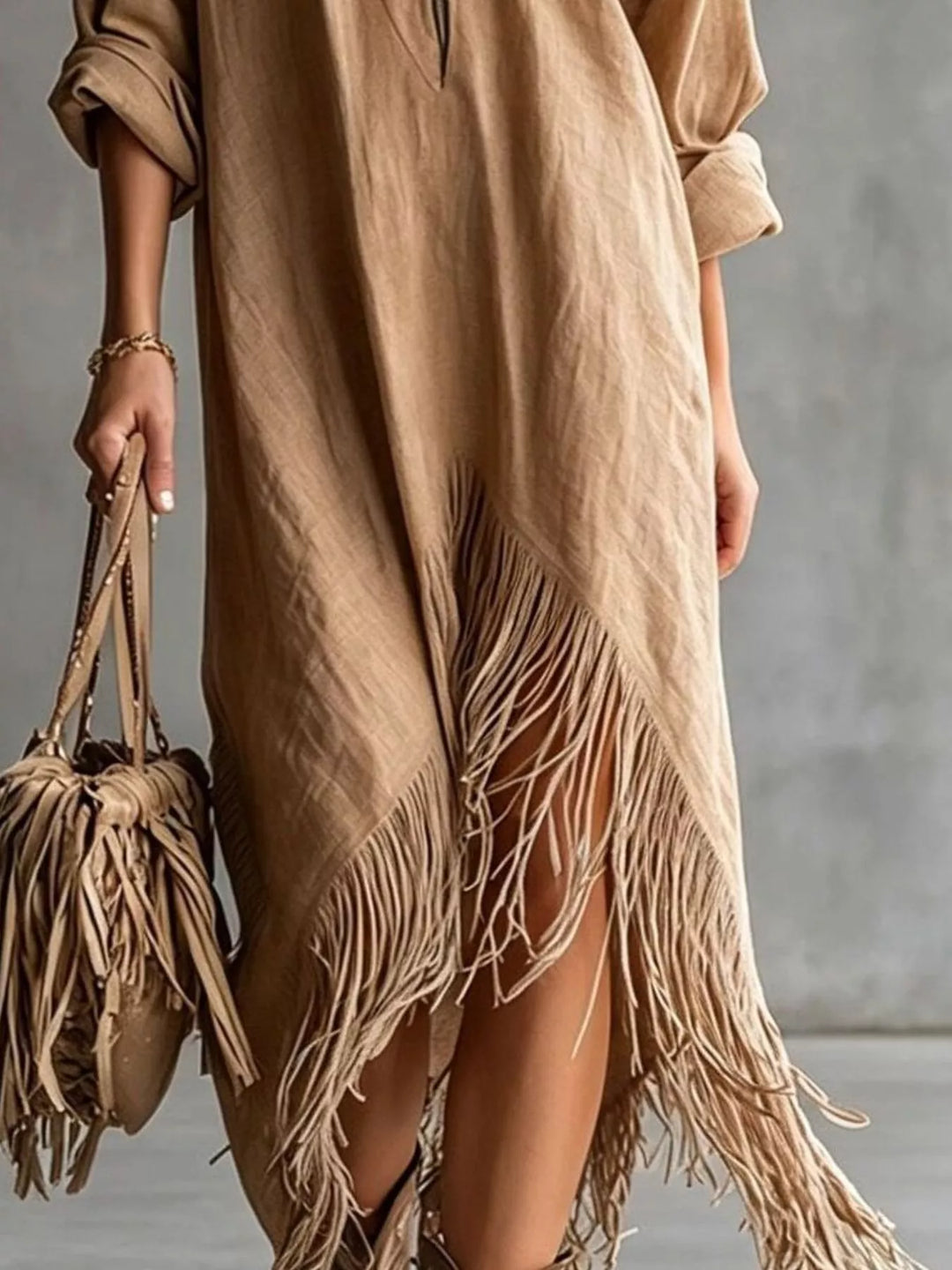 Camel shirt dress worn on a model, showing the zip front