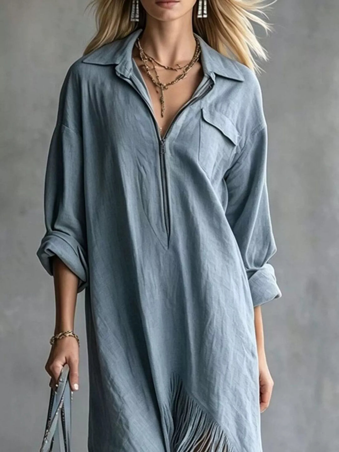 Dusty blue shirt dress worn on a model, showing the zip front