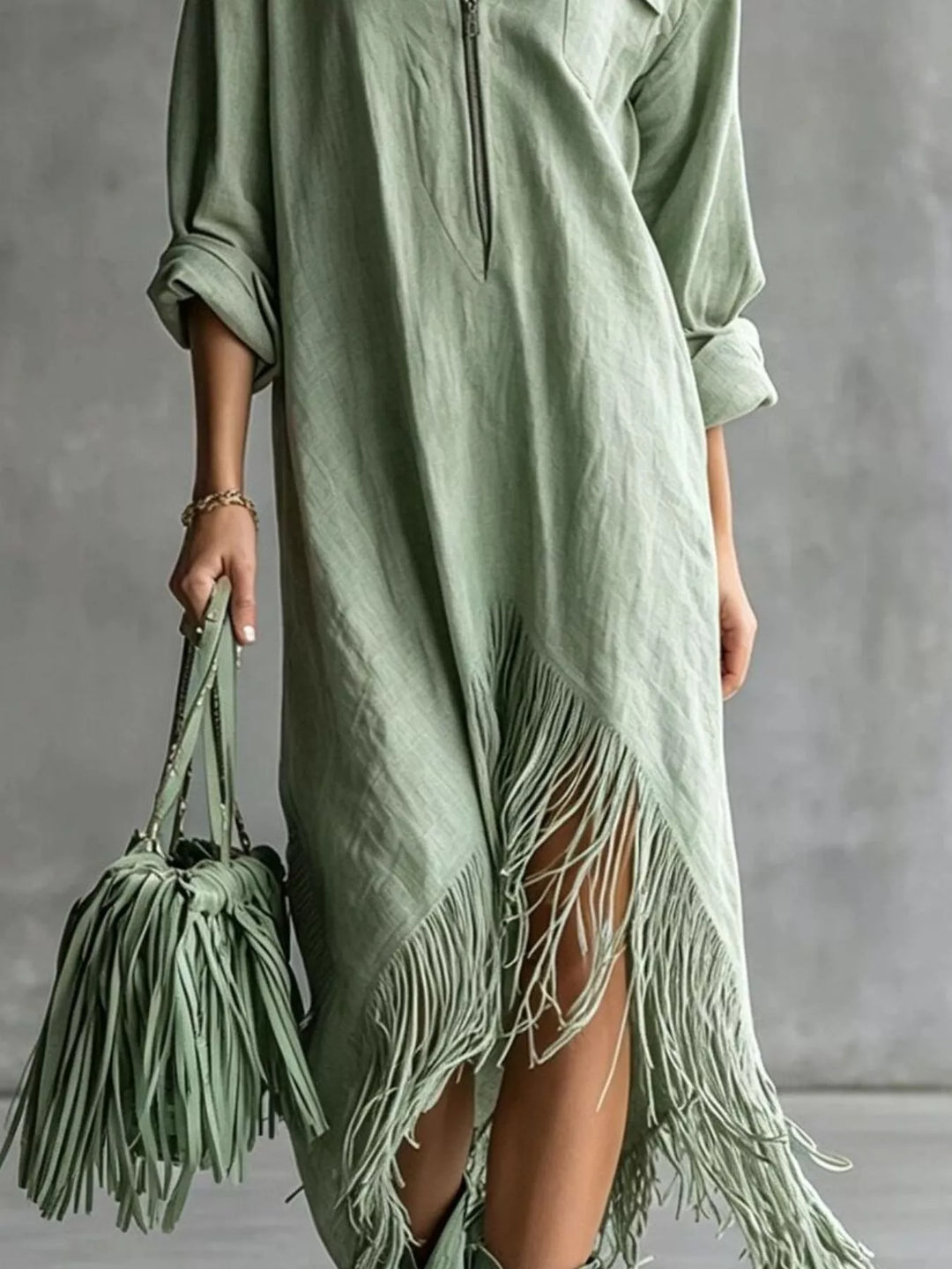Sage shirt dress worn on a model, showing the zip front
