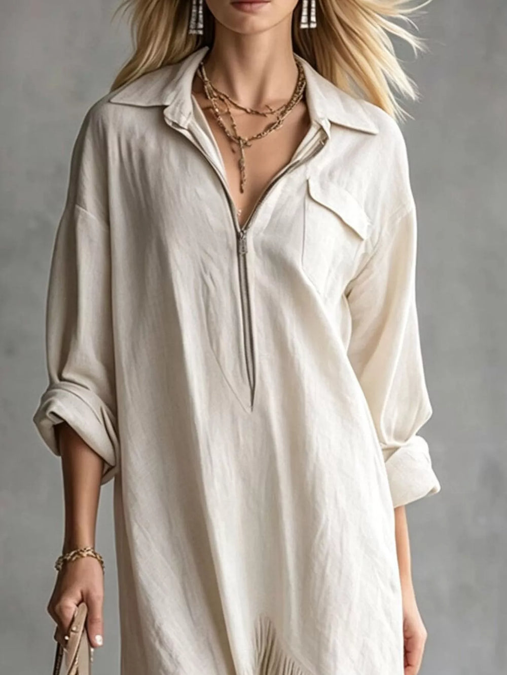 White shirt dress worn on a model, showing the zip front