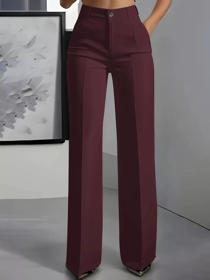Burgundy high waisted wide leg dress pants with front crease, front view