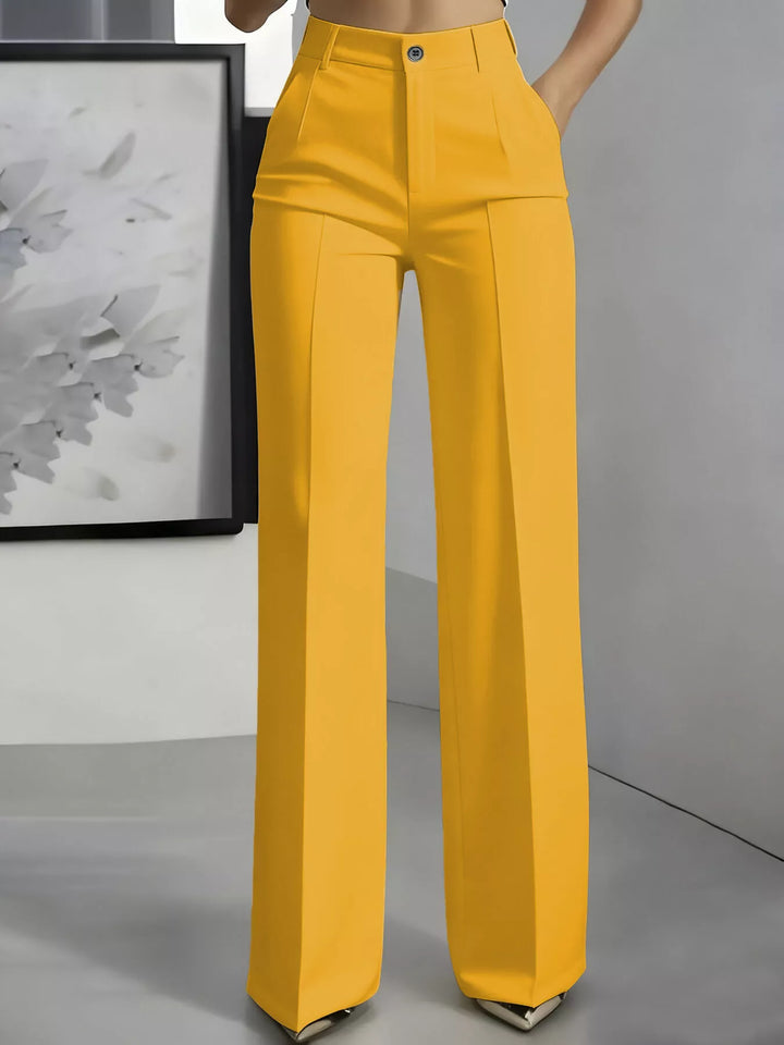 Yellow high waisted wide leg dress pants with front crease, front view