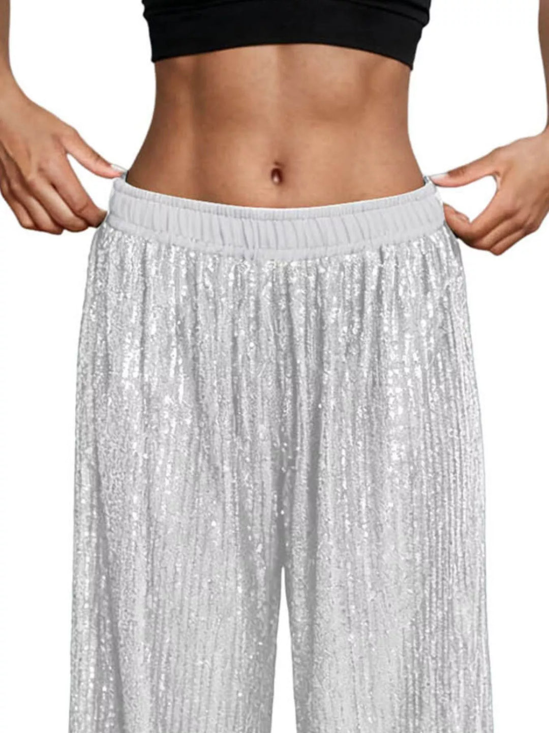 Close-up of the silver sequin elastic waistband and fabric