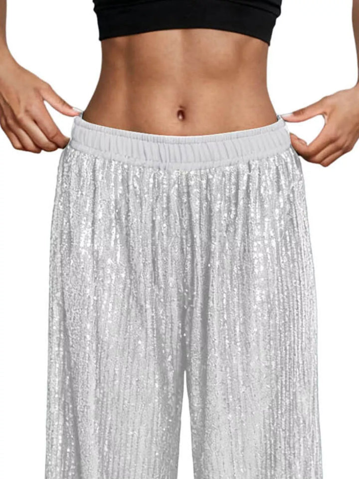 Close-up of the silver sequin elastic waistband and fabric