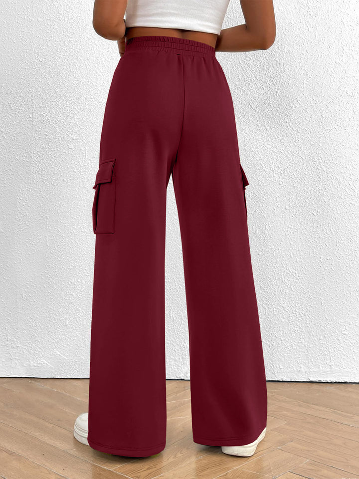 Back view of the women's burgundy high waisted wide leg cargo pants