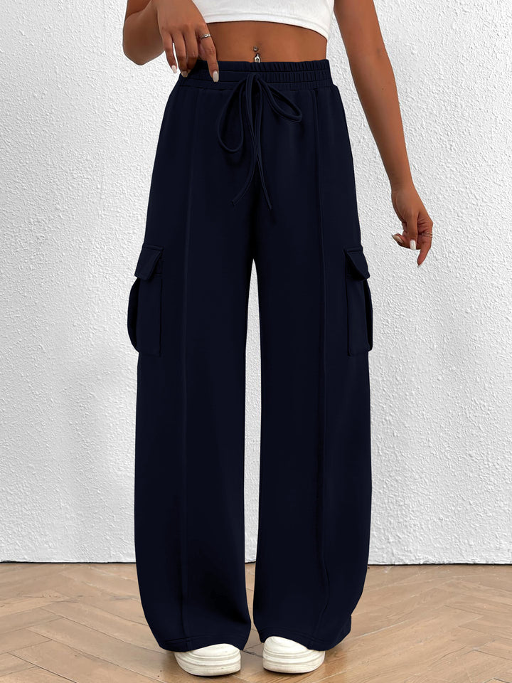 Navy wide leg cargo pants with high waist and drawstring, front view
