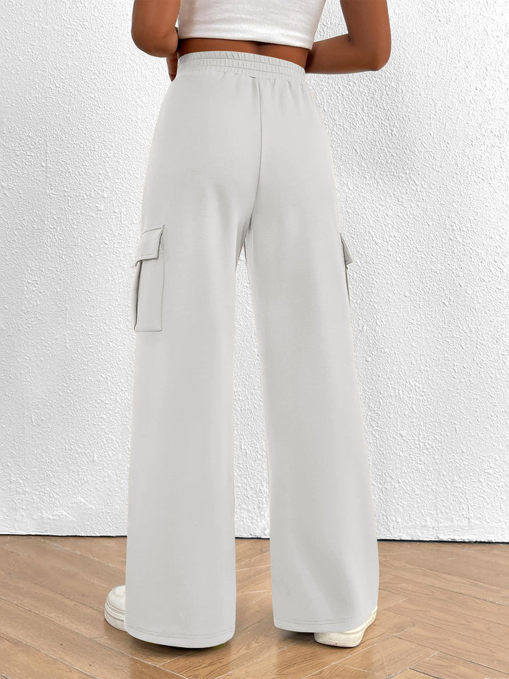 Back view of the women's white high waisted wide leg cargo pants