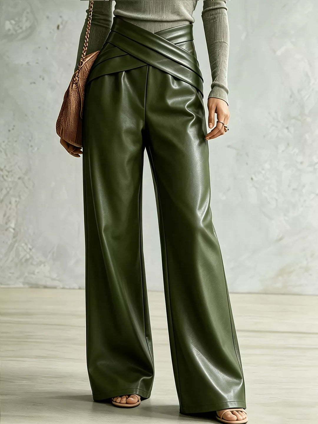 Women's army green wide leg pants with crossover waist, front view on model