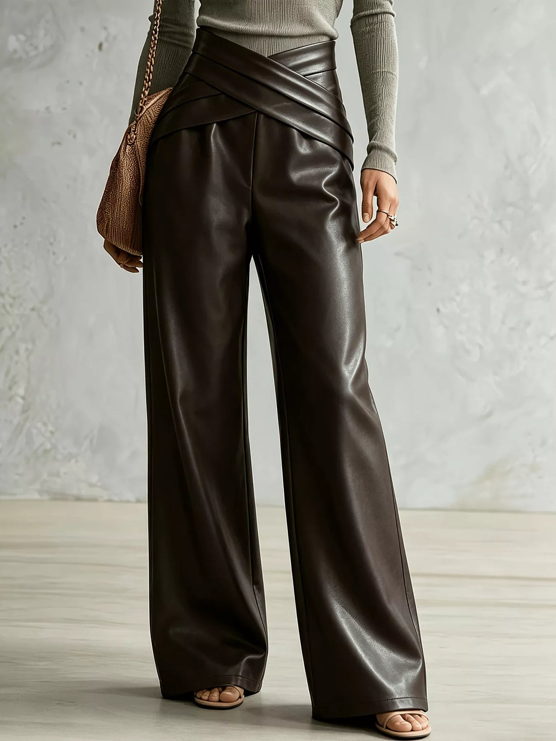 Brown wide leg pants with a crossover waist, full front view on model