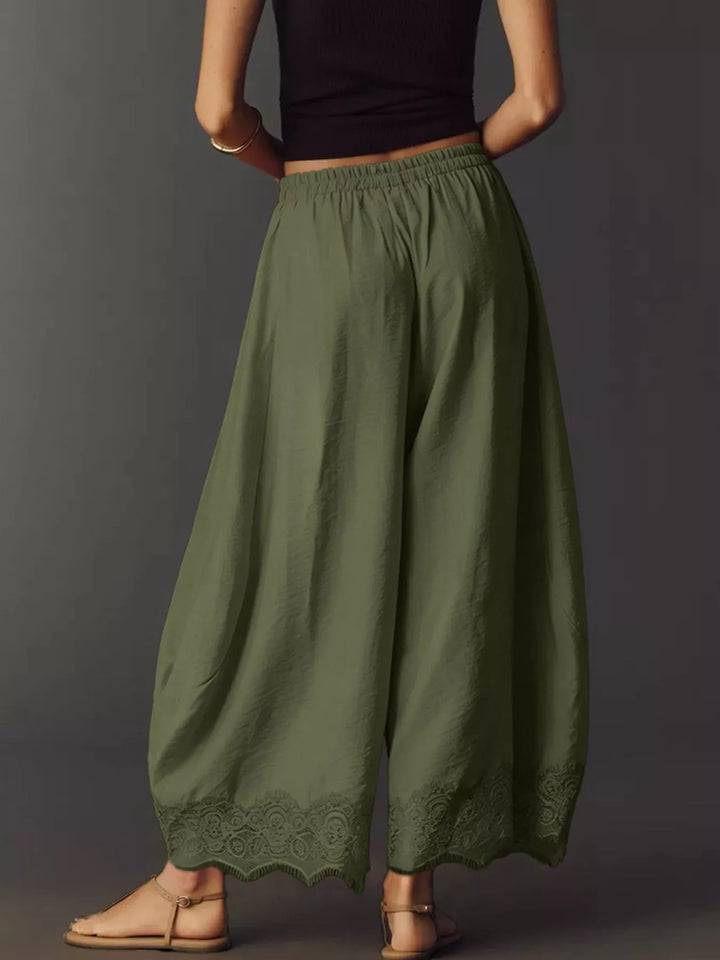 Back view of the army green pants with elastic waistband