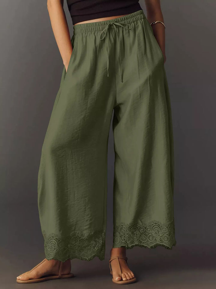 Army green wide leg pants front view with drawstring waist and lace hem
