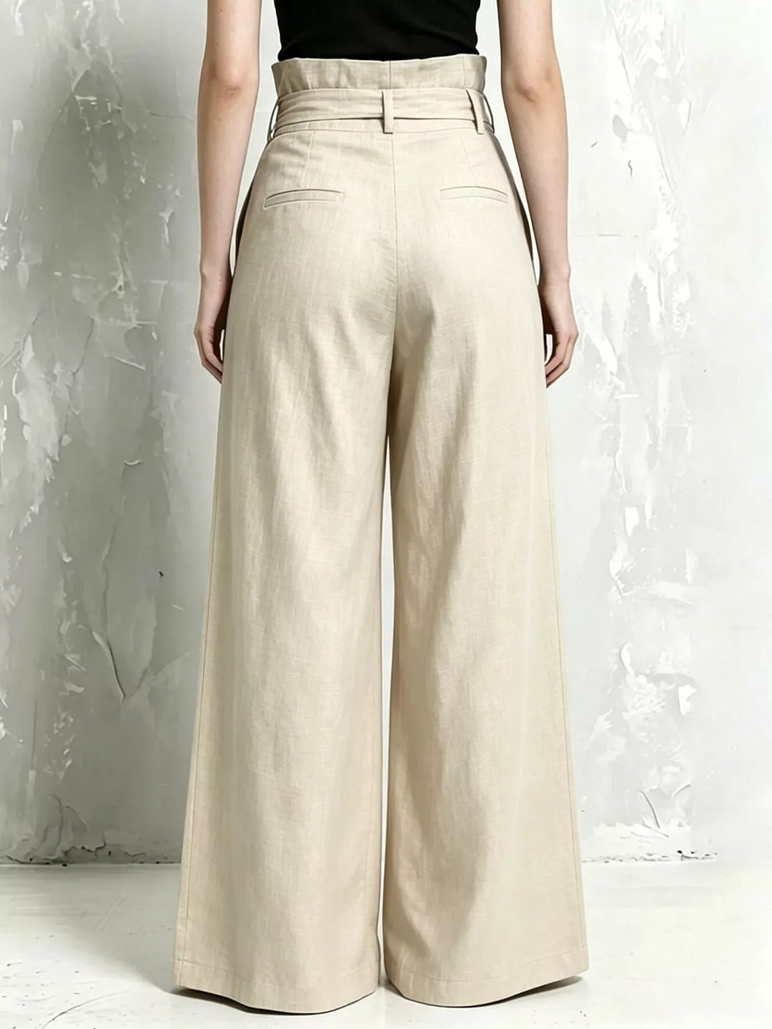 Back view of the beige wide leg pants with high waist