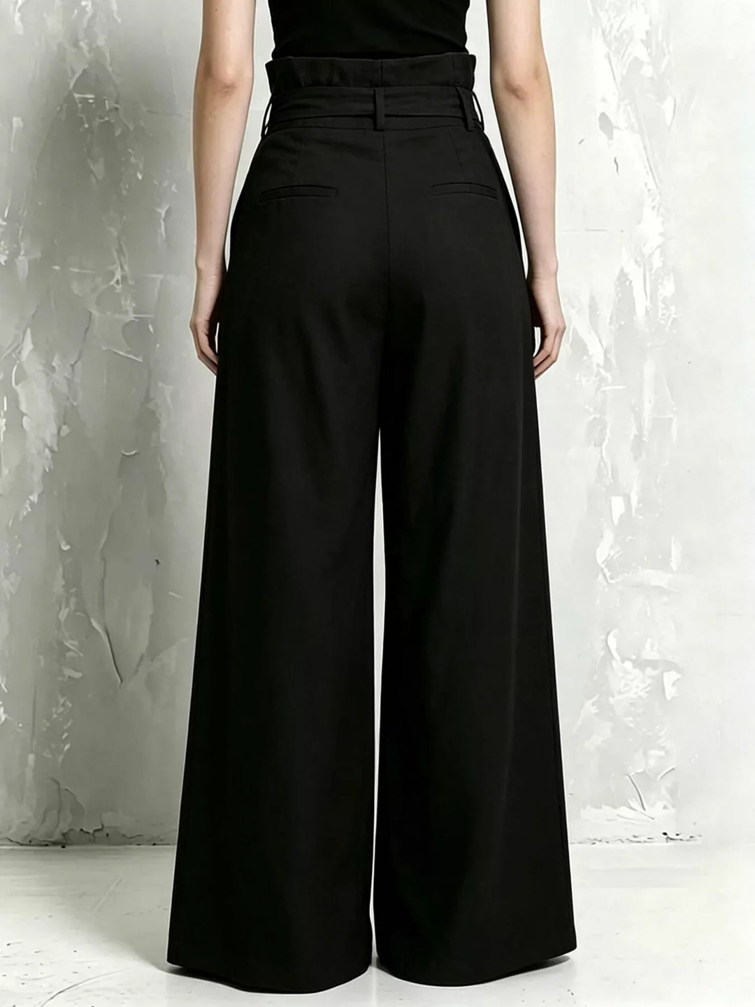 Back view of the black high waist wide leg pants with smooth fit