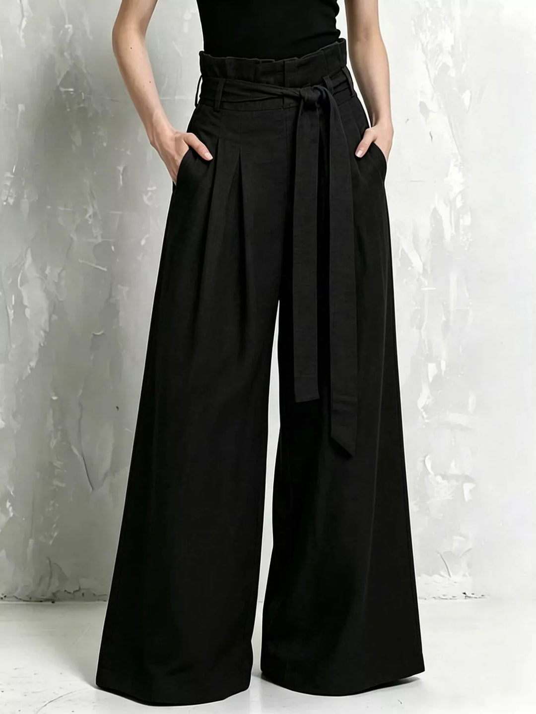 Black paperbag wide leg pants with tie belt, high waist front view