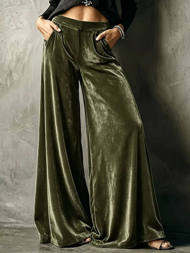Olive green high waisted wide leg pants in a shiny velvet-look fabric