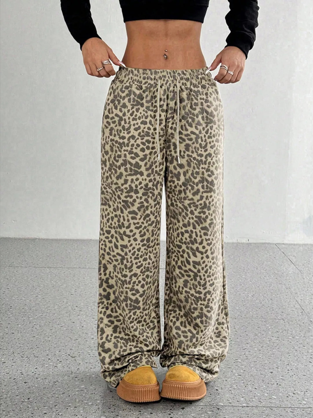 Khaki leopard print pants close-up of the drawstring waist