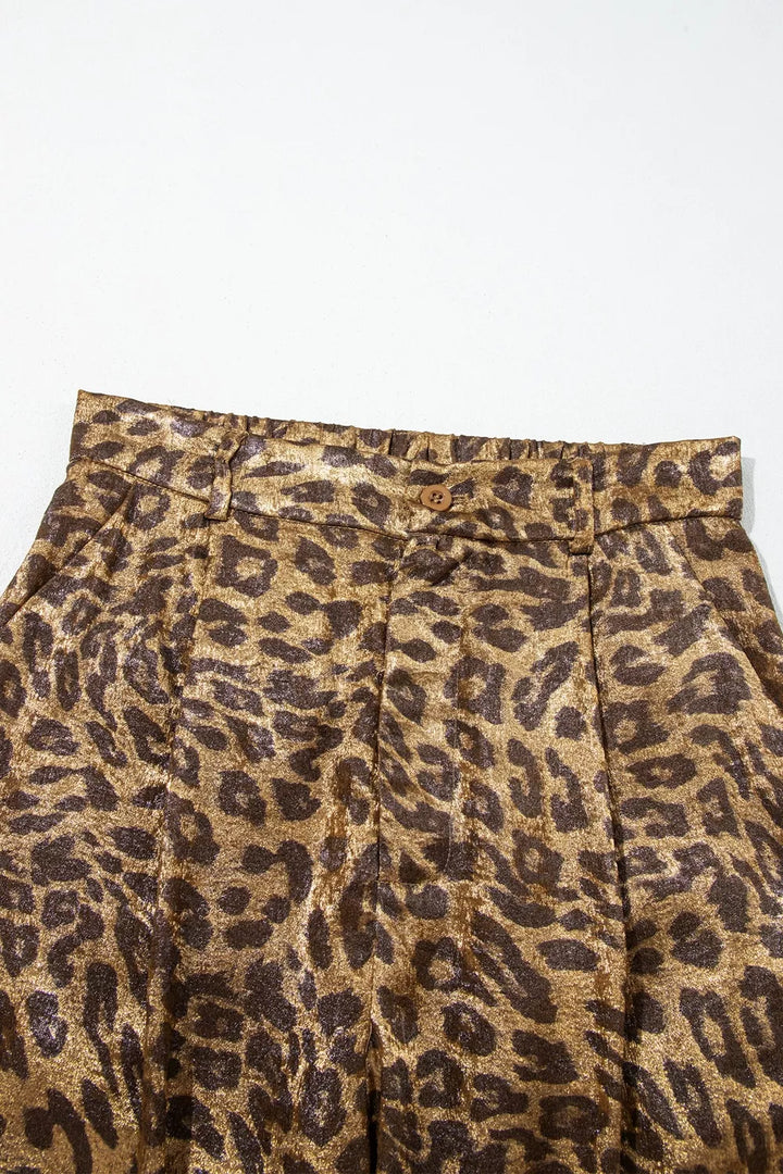 Close-up of the leopard print pants elastic waistband and pleats