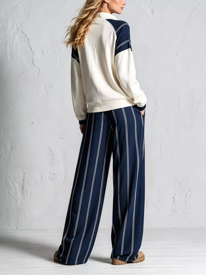 Navy pinstripe wide leg pants set seen from the back