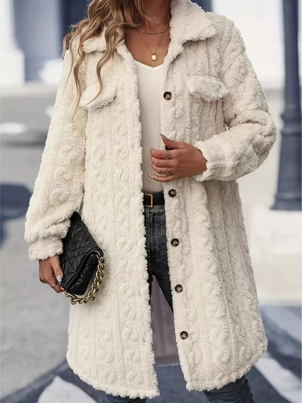 Women's fuzzy longline winter coat in cream, front view with button front and collar