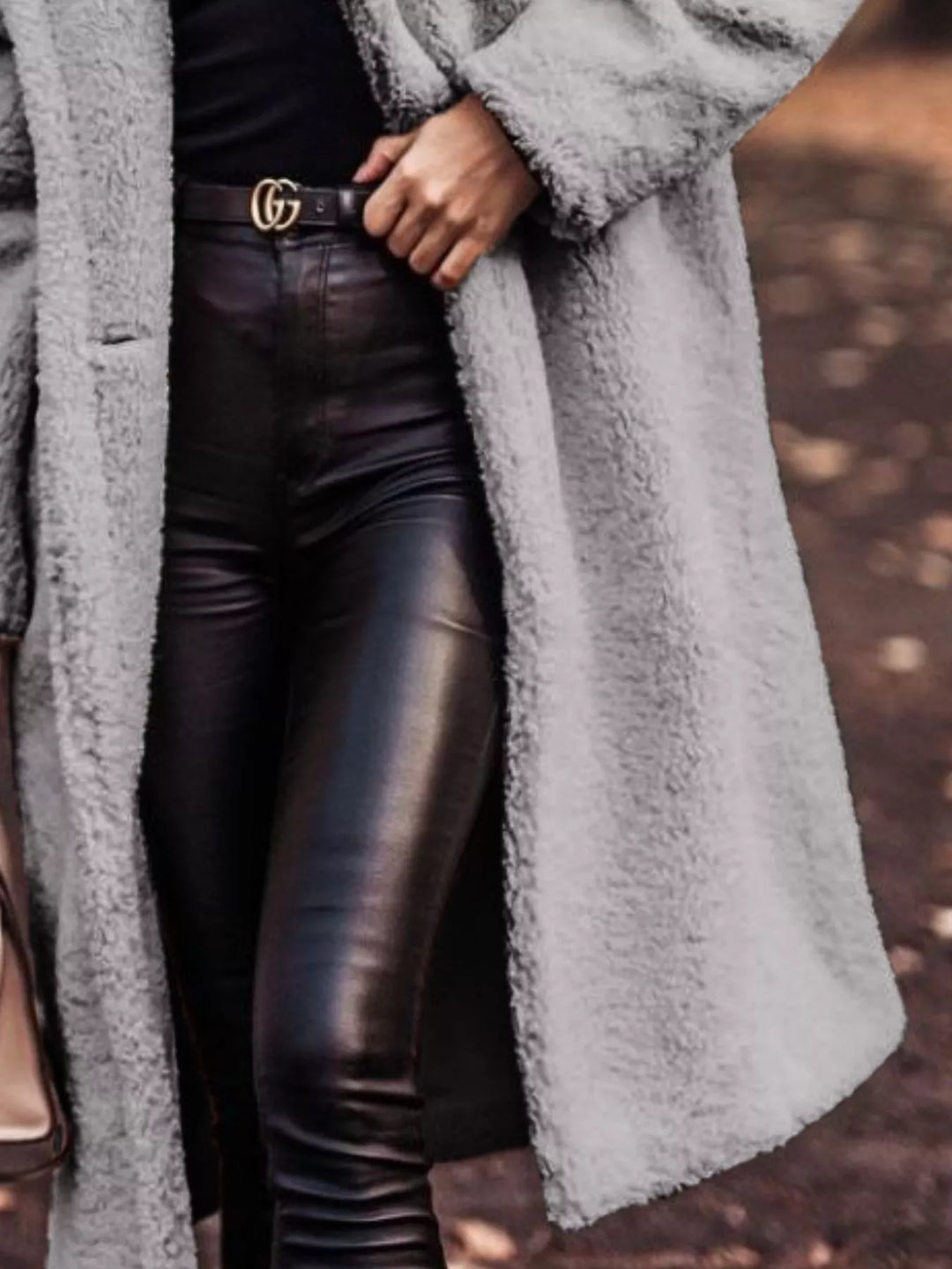 Gray longline open front coat showing the pocket and skirt length