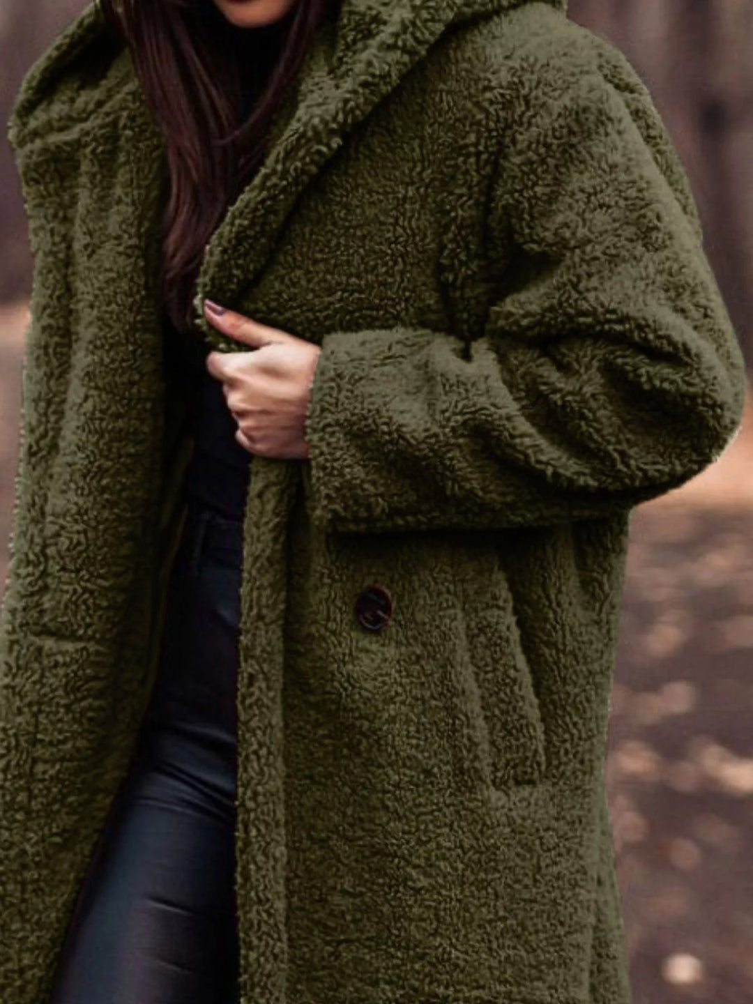 Olive longline open front coat showing the pocket and skirt length