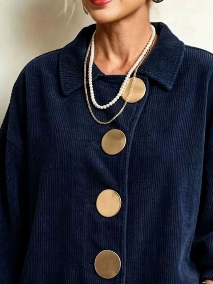 Corduroy-look scalloped hem round buttons in navy, close-up detail