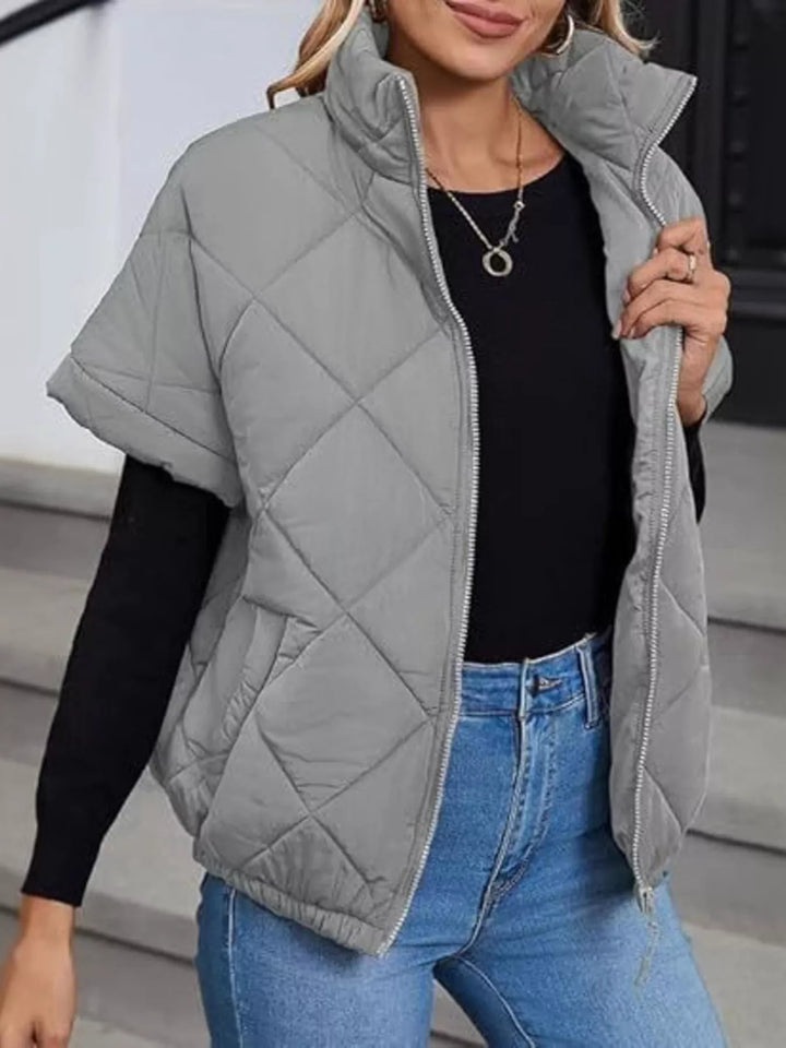 Women's winter jacket in grey, diamond quilted short sleeve zip