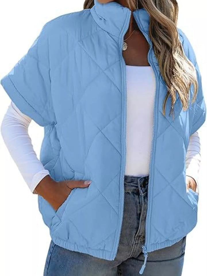 Diamond quilted short sleeve zip in sky blue, front view