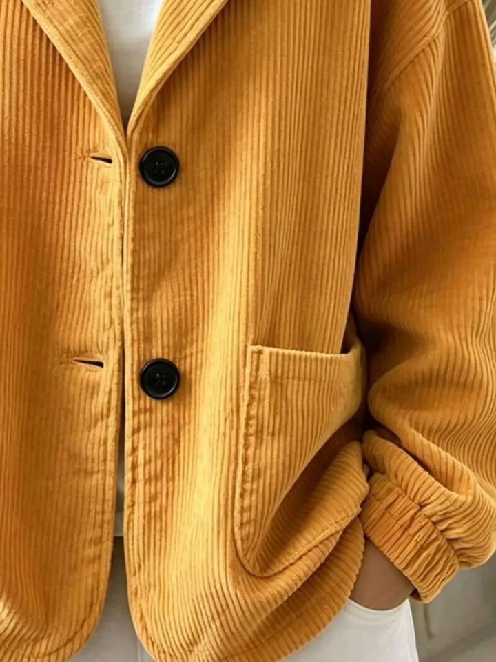 Hooded corduroy-look button front in mustard, close-up detail